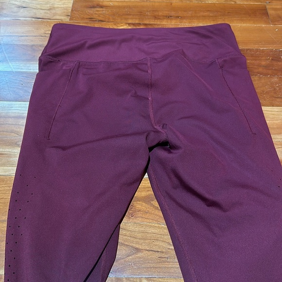 Active life perforated laser cut leggings.Black & Cherry. - Picture 13 of 14